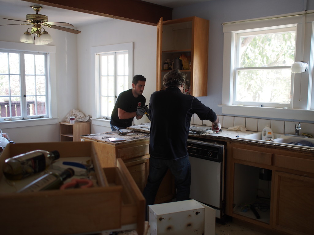Men at work.....ripping the tile off the counters